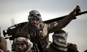 Лівійські опозиціонери просять Захід ліквідувати Каддафі