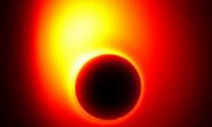 Астрономи вперше сфотографували чорну діру в хмарі газу й космічного пилу