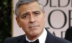 Джордж Клуні захищатиме Берлусконі в суді