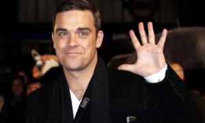 Роббі Вільямс пропонує інтрижку Мілі Куніс