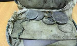 У підвалі в Луцьку знайшли скарб із золотих каблучок і срібних монет