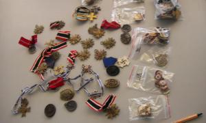 Німець хотів вивезти з України старовинні монети та ордени