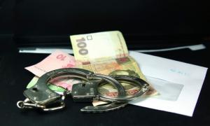 Слідчому міліції дали іспитовий термін за хабар у 5 тисяч гривень