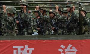 Китайська поліція застрелила 14 учасників заворушень