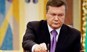 Янукович підписав скасування «законів про диктатуру» та амністію