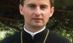 У Севастополі російські бойовики штурмують квартиру отця Миколи Квича, священника УГКЦ