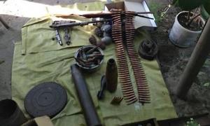 В місцевого жителя Херсону під час обшуку знайшли цілий арсенал зброї