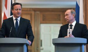 Прем’єр Британії відмовився потиснути руку Путіну