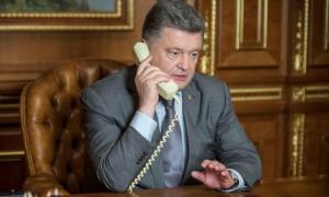 Порошенко по телефону поговорить про Донбас із Меркель, Олландом та Путіним