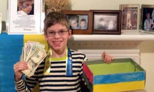 Маленький американець подарував джип українській армії