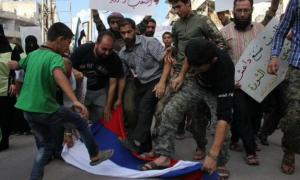 Сирійці потоптали російський прапор