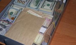 У чиновника Міноборони знайшли банківську комірку з пачками грошей 