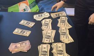 На Полтавщині поліцейського спіймали на хабарі на суму 30 тисяч доларів