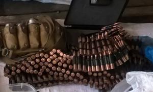 ​42-річний харківянин організував у Харкові перевалочну базу для збуту зброї та боєприпасів (фото, відео)