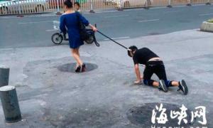 Мережу вразили знімки китаянки, яка вигулює свого чоловіка на собачому повідку