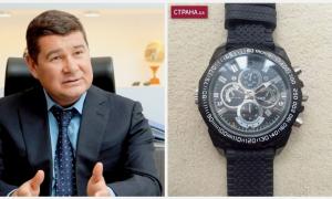 Онищенко показав годинник,  на який записував Порошенка