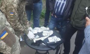 На Дніпропетровщині на хабарі попався слідчий поліції