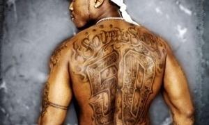 50 Cent стер татуювання