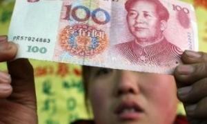 КНР збереже курс юаня без змін